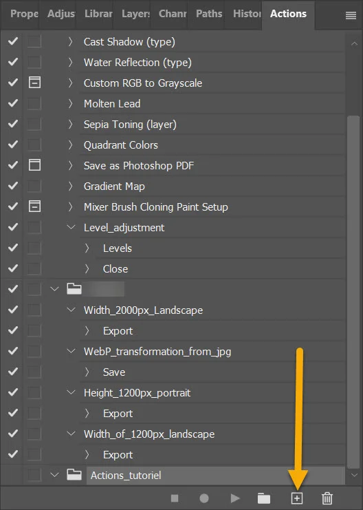 Panneau Action de Photoshop, une flèche pointe vers le symbole create new action